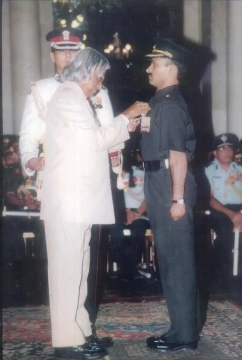 Shaurya Chakra medal being presented during a formal ceremony.